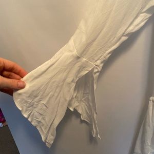 NanaMacs boutique white romper with flutter sleeve